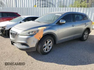 2015 Mazda CX-9 Sport z VIN JM3TB2BV2F0454150, wystawiony jako Copart lot #68082694 z przebiegiem 166 758 mil mil oraz Czysty tytuł • Clean title. Historia ofert i sprzedaży dostępna na DreamBid. Obrazek 1.