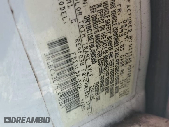 2009 Nissan Versa S z VIN 3N1BC13E79L490369, wystawiony jako Copart lot #51960035 z przebiegiem 160 125 mil mil oraz Nie do naprawy • Non repairable. Historia ofert i sprzedaży dostępna na DreamBid. Obrazek 13.