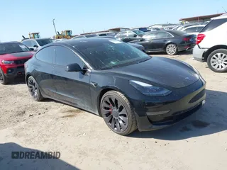 2021 Tesla Model 3 Performance z VIN 5YJ3E1EC9MF026546, wystawiony jako IAAI lot #41977863 z przebiegiem 42 847 mil mil oraz . Historia ofert i sprzedaży dostępna na DreamBid. Obrazek 1.