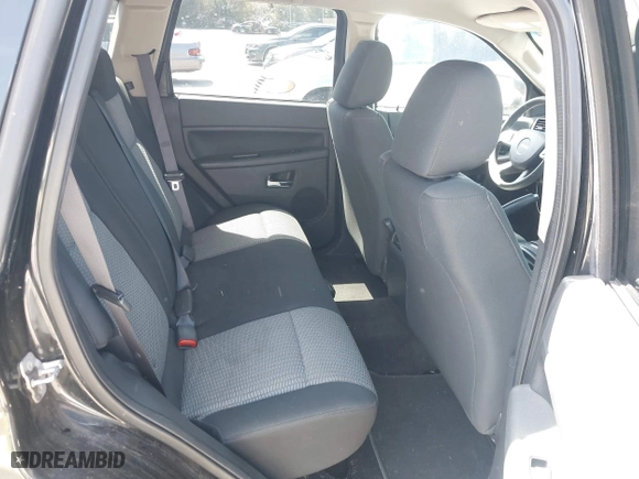 2010 Jeep Grand Cherokee Laredo with VIN 1J4PR4GK2AC104857, listed as a IAAI auction lot 42009569 with 131,986 mi miles. Bid and sale history available at carsss.com. Image 8.