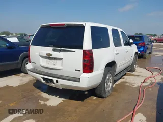 2010 Chevrolet Tahoe LS with VIN 1GNMCAE3XAR215407, listed as a IAAI auction lot 42185643 with 201,070 mi miles and . Bid and sale history available at DreamBid. Image 4.