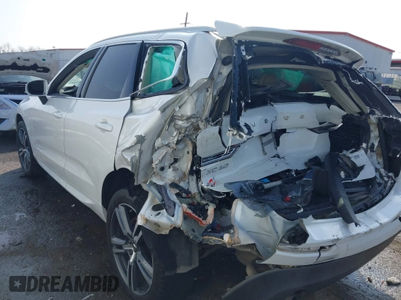 2019 Volvo XC60 Momentum with VIN LYV102DK0KB219297, listed as a IAAI auction lot 41781458 with 80,524 mi miles and . Bid and sale history available at DreamBid. Image 3.