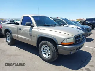 2002 Dodge Dakota with VIN 1B7FL16X72S642881, listed as a IAAI auction lot 42153560 with 220,917 mi miles and . Bid and sale history available at carsss.com. Image 1.