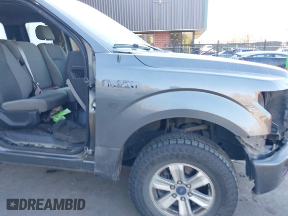 2015 Ford F-150 XLT with VIN 1FTEX1E88FKF22622, listed as a IAAI auction lot 41402747 with 214,667 mi miles. Bid and sale history available at carsss.com. Image 19.