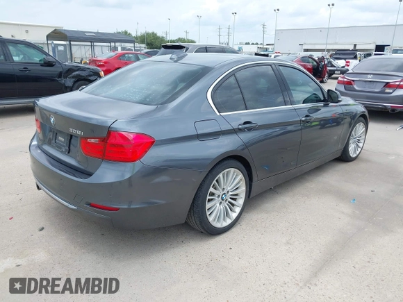2015 BMW 3 Series 328i с VIN WBA3A5G58FNS87928, выставлен на аукционе IAAI как лот 42392498 с пробегом 108 697 миль миль и . История ставок и продаж доступна на DreamBid. Изображение 4.