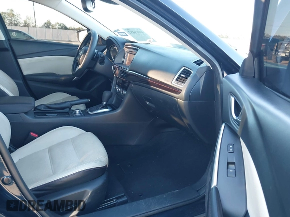2015 Mazda 6 i Grand Touring with VIN JM1GJ1W58F1201507, listed as a IAAI auction lot 40916832 with 78,322 mi miles and . Bid and sale history available at DreamBid. Image 5.