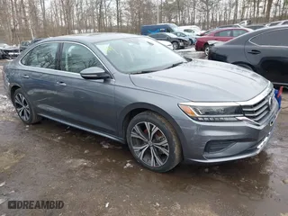 2022 Volkswagen Passat 2.0T SE with VIN 1VWSA7A3XNC004020, listed as a IAAI auction lot 41279389 with 63,322 mi miles. Bid and sale history available at carsss.com. Image 1.