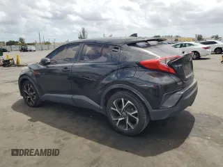 2018 Toyota C-HR XLE with VIN NMTKHMBX1JR015428, listed as a Copart auction lot 51111425 with 95,500 mi miles and Salvage Title. Bid and sale history available at carsss.com. Image 2.