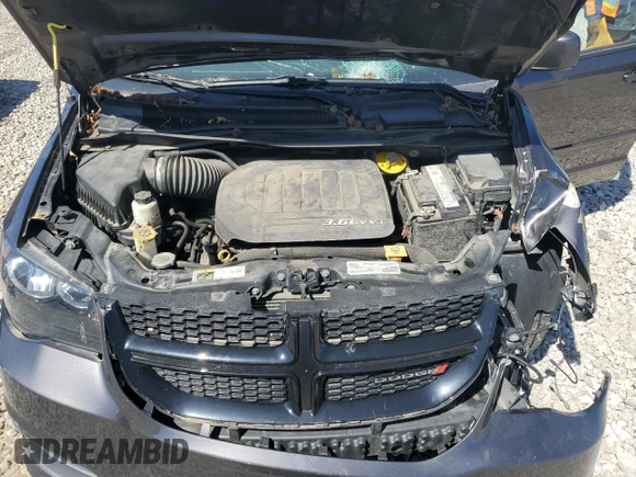 2017 Dodge Grand Caravan SE Plus z VIN 2C4RDGBG1HR619075, wystawiony jako Copart lot #54713495 z przebiegiem 115 463 mil mil oraz Szkoda całkowita • Salvage title. Historia ofert i sprzedaży dostępna na DreamBid. Obrazek 12.