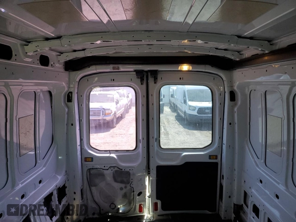 2015 Ford Transit Cargo with VIN 1FTNR2CM7FKA15808, listed as a Copart auction lot 55342165 with 98,996 mi miles and Salvage Title. Bid and sale history available at DreamBid. Image 10.