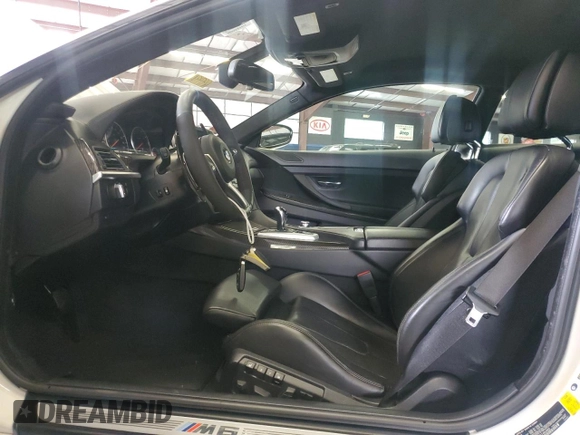 2014 BMW M6 z VIN WBSLX9C58ED160480, wystawiony jako Copart lot #64464985 z przebiegiem 58 514 mil mil oraz Czysty tytuł • Clean title. Historia ofert i sprzedaży dostępna na DreamBid. Obrazek 7.