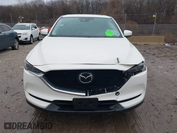 2021 Mazda CX-5 Grand Touring with VIN JM3KFADM4M1340141, listed as a IAAI auction lot 41194711 with 37,887 mi miles. Bid and sale history available at carsss.com. Image 12.