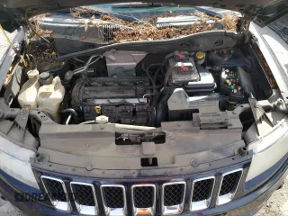 2011 Jeep Compass with VIN 1J4NT1FA1BD176063, listed as a Copart auction lot 50216285 with 136,742 mi miles and Non Repairable. Bid and sale history available at carsss.com. Image 12.