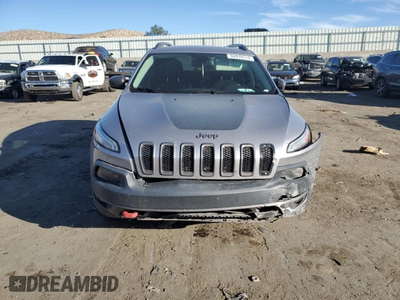 2018 Jeep Cherokee Trailhawk with VIN 1C4PJMBB9JD571773, listed as a Copart auction lot 82876514 with 137,565 mi miles and Salvage title. Bid and sale history available at DreamBid. Image 5.