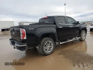 2015 GMC Canyon 4WD SLT with VIN 1GTG6CE38F1262174, listed as a Copart auction lot 80066724 with 154,267 mi miles and Salvage Title. Bid and sale history available at carsss.com. Image 3.