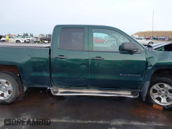 2014 Chevrolet Silverado 1500 LT with VIN 1GCVKREC7EZ312679, listed as a IAAI auction lot 40874395 with 153,234 mi miles and . Bid and sale history available at DreamBid. Image 13.