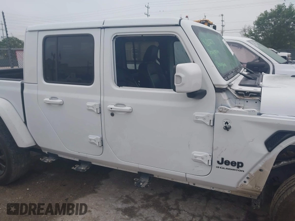 2023 Jeep Gladiator Overland z VIN 1C6HJTFGXPL522706, wystawiony jako IAAI lot #41923655 z przebiegiem 33 010 mil mil oraz . Historia ofert i sprzedaży dostępna na DreamBid. Obrazek 14.