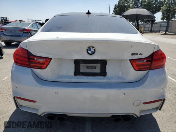 2015 BMW M4 with VIN WBS3R9C51FK334414, listed as a Copart auction lot 52451035 with 122,436 mi miles and Salvage title. Bid and sale history available at DreamBid. Image 6.