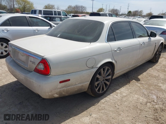 2008 Jaguar XJ Vanden Plas with VIN SAJWA82BX8SH28725, listed as a IAAI auction lot 41749097 with 64,440 mi miles. Bid and sale history available at carsss.com. Image 4.
