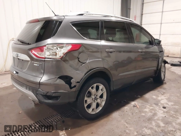2014 Ford Escape Titanium with VIN 1FMCU9JX9EUA56421, listed as a IAAI auction lot 41392372 with 117,234 mi miles. Bid and sale history available at carsss.com. Image 4.