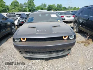 2019 Dodge Challenger SXT с VIN 2C3CDZAG7KH677566, выставлен на аукционе IAAI как лот 42584921 с пробегом 58 374 миль миль и . История ставок и продаж доступна на DreamBid. Изображение 13.