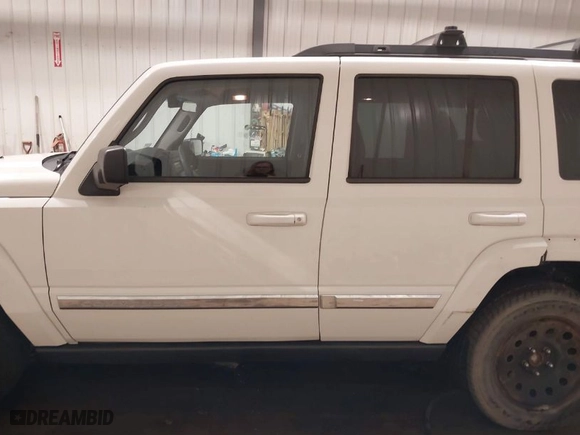 2010 Jeep Commander Sport with VIN 1J4RG4GK7AC132121, listed as a IAAI auction lot 41187854 with 155,413 mi miles. Bid and sale history available at carsss.com. Image 15.