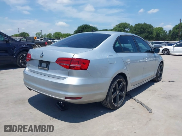 2015 Volkswagen Jetta S with VIN 3VW2K7AJ8FM217026, listed as a IAAI auction lot 42395393 with 181,789 mi miles and . Bid and sale history available at DreamBid. Image 4.
