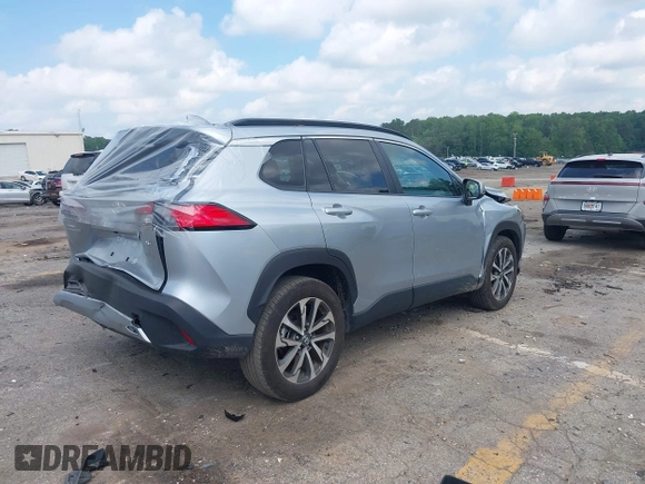 2023 Toyota Corolla Cross XLE with VIN 7MUDAAAG0PV057750, listed as a IAAI auction lot 42302284 with 31,404 mi miles and . Bid and sale history available at DreamBid. Image 4.