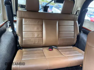 2012 Jeep Wrangler Rubicon with VIN 1C4HJWCG5CL152550, listed as a Copart auction lot 66047195 with 187,458 mi miles and Clean title. Bid and sale history available at DreamBid. Image 6.