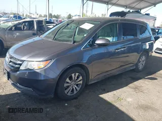 2014 Honda Odyssey EX-L with VIN 5FNRL5H61EB079742, listed as a IAAI auction lot 41992473 with 125,397 mi miles and . Bid and sale history available at carsss.com. Image 2.