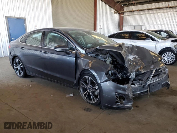 2020 Ford Fusion Titanium with VIN 3FA6P0K92LR115615, listed as a Copart auction lot 60471975 with 73,069 mi miles and Salvage title. Bid and sale history available at DreamBid. Image 4.
