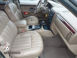 2000 Jeep Grand Cherokee Limited with VIN 1J4GW58S8YC361416, listed as a IAAI auction lot 42342095 with 138,100 mi miles and . Bid and sale history available at DreamBid. Image 5.