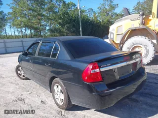 2005 Chevrolet Malibu with VIN 1G1ZS52F15F332817, listed as a IAAI auction lot 41080228 with 158,235 mi miles. Bid and sale history available at carsss.com. Image 3.