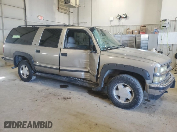 1999 Chevrolet Suburban z VIN 3GNFK16R4XG250550, wystawiony jako Copart lot #51941515 z przebiegiem 202 667 mil mil oraz Szkoda całkowita • Salvage title. Historia ofert i sprzedaży dostępna na DreamBid. Obrazek 4.