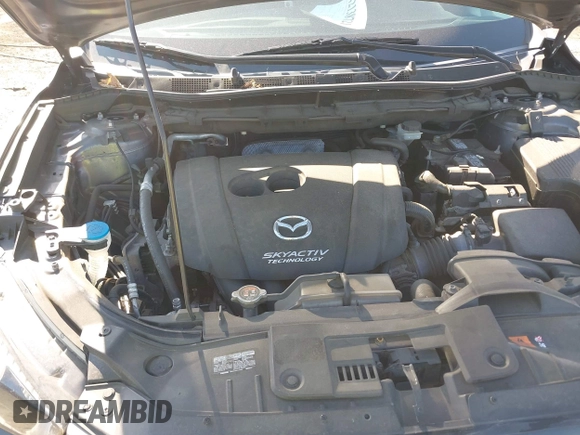 2014 Mazda CX-5 Grand Touring with VIN JM3KE4DY2E0312952, listed as a IAAI auction lot 42138721 with 99,993 mi miles and . Bid and sale history available at DreamBid. Image 10.