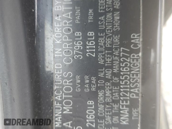 2005 Kia Spectra LX z VIN KNAFE121155165277, wystawiony jako Copart lot #55357155 z przebiegiem Nie podano mil oraz Czysty tytuł • Clean title. Historia ofert i sprzedaży dostępna na DreamBid. Obrazek 12.