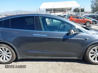 2018 Tesla Model X 75D with VIN 5YJXCBE26JF121937, listed as a IAAI auction lot 41652666 with 93,478 mi miles and . Bid and sale history available at carsss.com. Image 13.