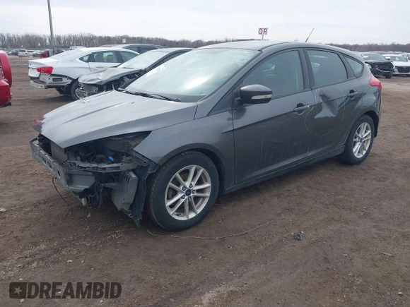 2015 Ford Focus SE with VIN 1FADP3K27FL303111, listed as a IAAI auction lot 41802182 with 195,834 mi miles and . Bid and sale history available at DreamBid. Image 2.