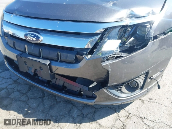 2012 Ford Fusion SE z VIN 3FAHP0HA8CR401382, wystawiony jako IAAI lot #41739680 z przebiegiem 73 404 mil mil oraz . Historia ofert i sprzedaży dostępna na DreamBid. Obrazek 6.