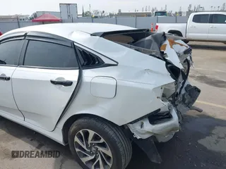 2016 Honda Civic EX with VIN 19XFC2F72GE097060, listed as a IAAI auction lot 41626940 with 156,941 mi miles and . Bid and sale history available at DreamBid. Image 19.