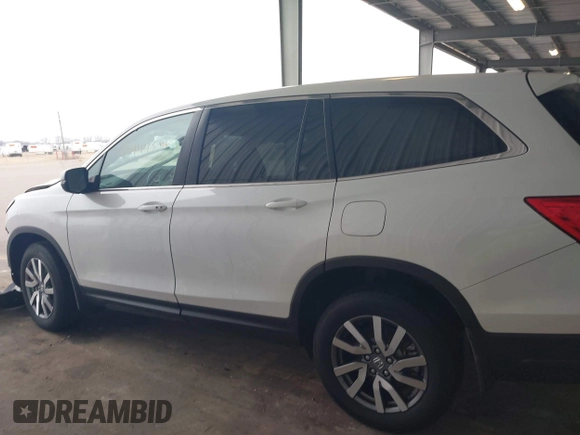 2022 Honda Pilot EX-L with VIN 5FNYF6H58NB097283, listed as a IAAI auction lot 40944566 with 22,027 mi miles and . Bid and sale history available at DreamBid. Image 14.