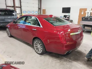 2016 Cadillac CTS Luxury Collection AWD z VIN 1G6AX5SX6G0124584, wystawiony jako IAAI lot #41235515 z przebiegiem 82 286 mil mil oraz . Historia ofert i sprzedaży dostępna na DreamBid. Obrazek 3.