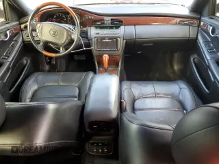 2002 Cadillac DeVille DTS with VIN 1G6KF57962U233811, listed as a Copart auction lot 80435034 with 62,005 mi miles and Salvage Title. Bid and sale history available at carsss.com. Image 8.