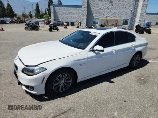 2015 BMW 5 Series 528i with VIN WBA5A5C59FD518341, listed as a Copart auction lot 63881785 with 147,489 mi miles and Salvage title. Bid and sale history available at DreamBid. Image 1.