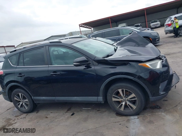 2016 Toyota RAV4 XLE with VIN 2T3WFREV9GW276278, listed as a IAAI auction lot 41906293 with 112,000 mi miles. Bid and sale history available at carsss.com. Image 13.
