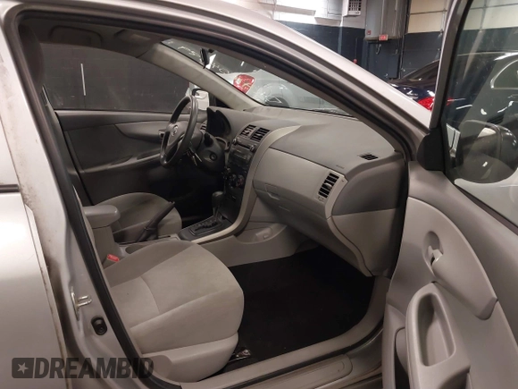 2010 Toyota Corolla with VIN 2T1BU4EEXAC255917, listed as a IAAI auction lot 41654689 with 46,960 mi miles. Bid and sale history available at carsss.com. Image 5.