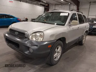 2004 Hyundai Santa Fe GLS with VIN KM8SC73D44U757341, listed as a IAAI auction lot 42254675 with 237,770 mi miles and . Bid and sale history available at DreamBid. Image 2.