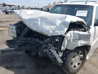 2005 Cadillac Escalade z VIN 1GYEC63N25R200026, wystawiony jako IAAI lot #41761210 z przebiegiem 226 747 mil mil oraz . Historia ofert i sprzedaży dostępna na DreamBid. Obrazek 6.