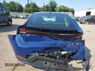 2023 Toyota Prius LE z VIN JTDACAAU8P3000694, wystawiony jako Copart lot #63066504 z przebiegiem 34 371 mil mil oraz Szkoda całkowita • Salvage title. Historia ofert i sprzedaży dostępna na DreamBid. Obrazek 6.