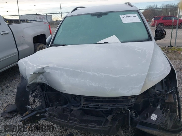 2016 Volkswagen Tiguan SEL with VIN WVGAV7AXXGW534068, listed as a IAAI auction lot 41596440 with 85,022 mi miles and . Bid and sale history available at DreamBid. Image 12.